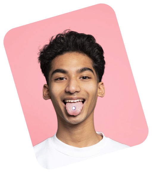 Smiling mulato man with tongue piercing